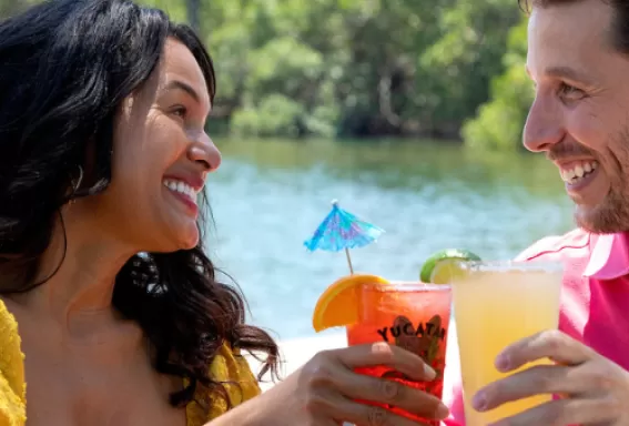 A couple enjoys waterfront dining